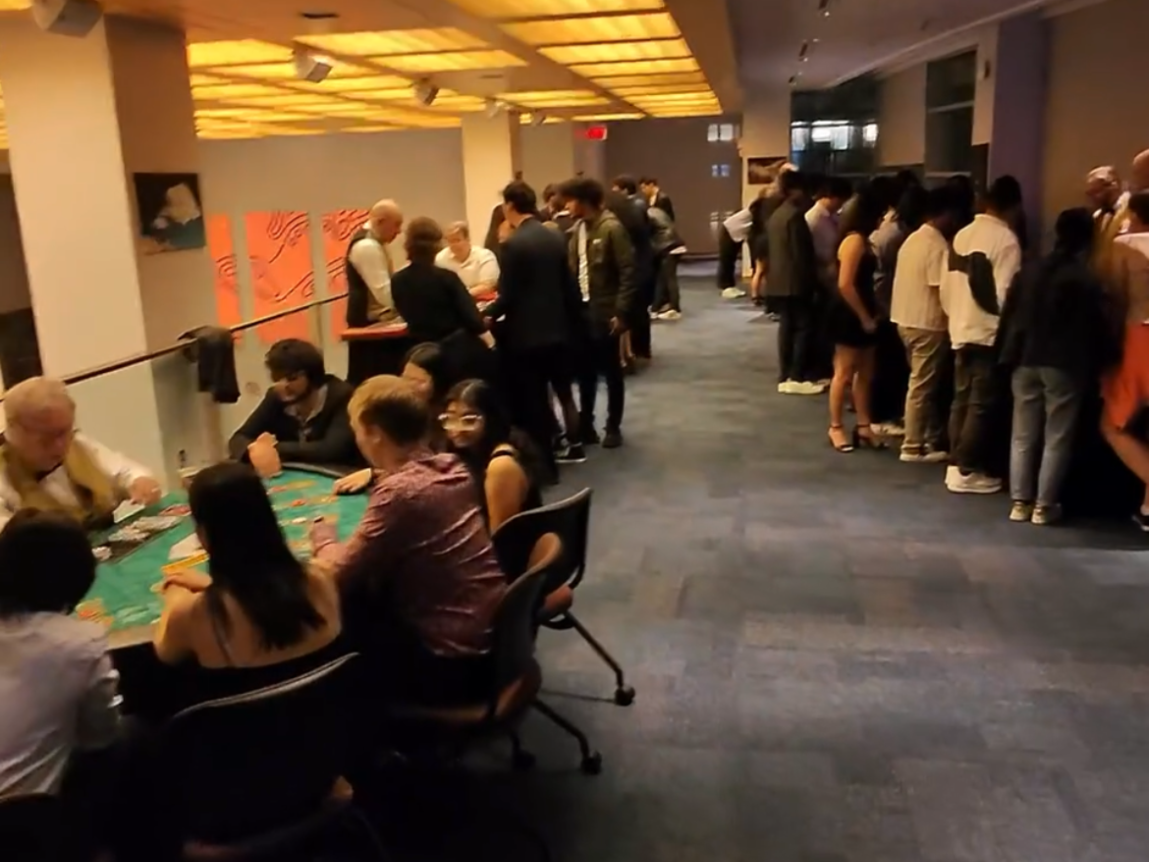 View of the casino night tables and students