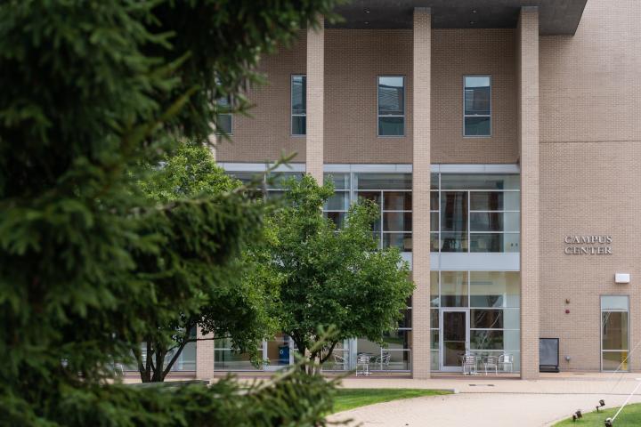 The Campus Center at Olin College of Engineering A photo of a beige colored building with several windows