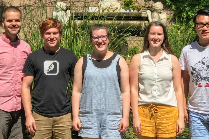 Gretchen Rice '20 and colleagues pose for a photo Gretchen Rice '20 and colleagues pose for a photo