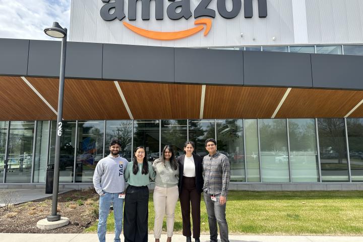 Five SCOPE students in front of Amazon HQ