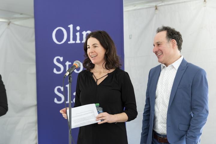 Gillian Epstein and Jon Adler speak at Olin Story Slam. 