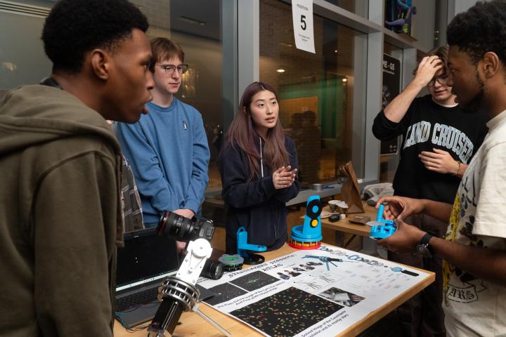 Olin College of Engineering students present their PIE project to the community.