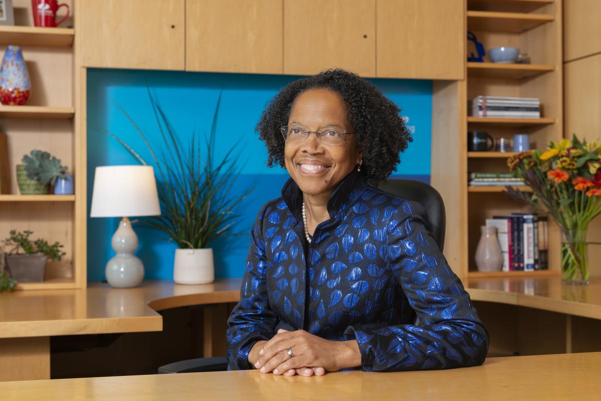 Olin College President Gilda A. Barabino sitting at desk. Olin College President Gilda A. Barabino sitting at desk.
