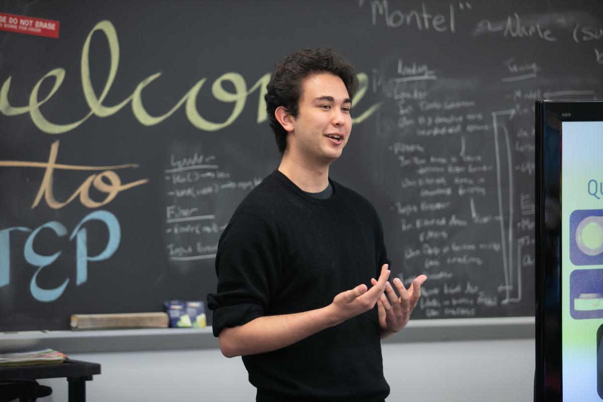 Olin student Eamon Ito-Fisher '23 talks during a recent STEP class. Olin student Eamon Ito-Fisher talks in front of a blackboard during a recent STEP class.