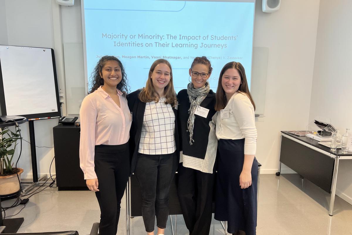 FIE Conference image Vaani Bhatnagar, Julia Benton, Professor Yevgeniya V. Zastavker and Meagan Martin smiling at camera