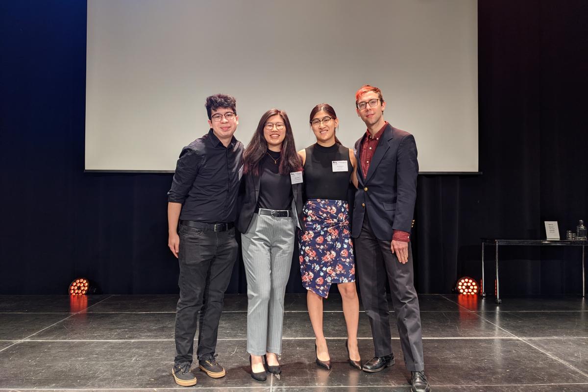 FIE Conference Image Pérez ’24, Sydney Chung ’24, Jen Sundstrom ’24, and Grant Goodall ’24 posing on stage