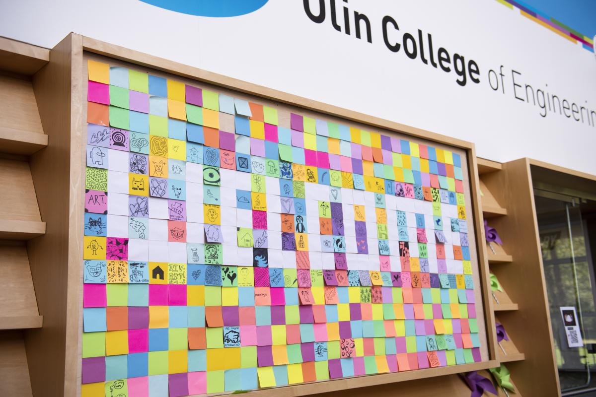 "Welcome" spelled out in sticky notes "Welcome" spelled out in sticky notes