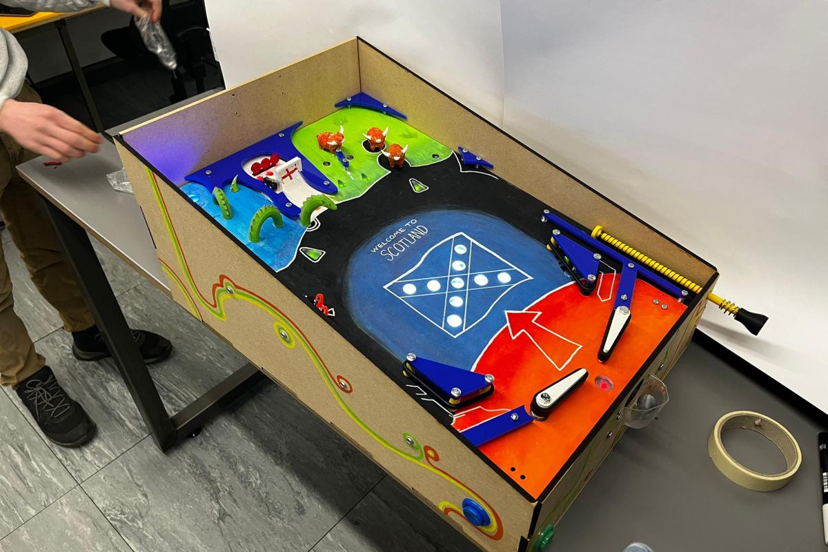 The Welcome to Scotland pinball machine made for the Olin course, Principles of Engineering (PIE). The Welcome to Scotland pinball machine made for the Olin course, Principles of Engineering (PIE).