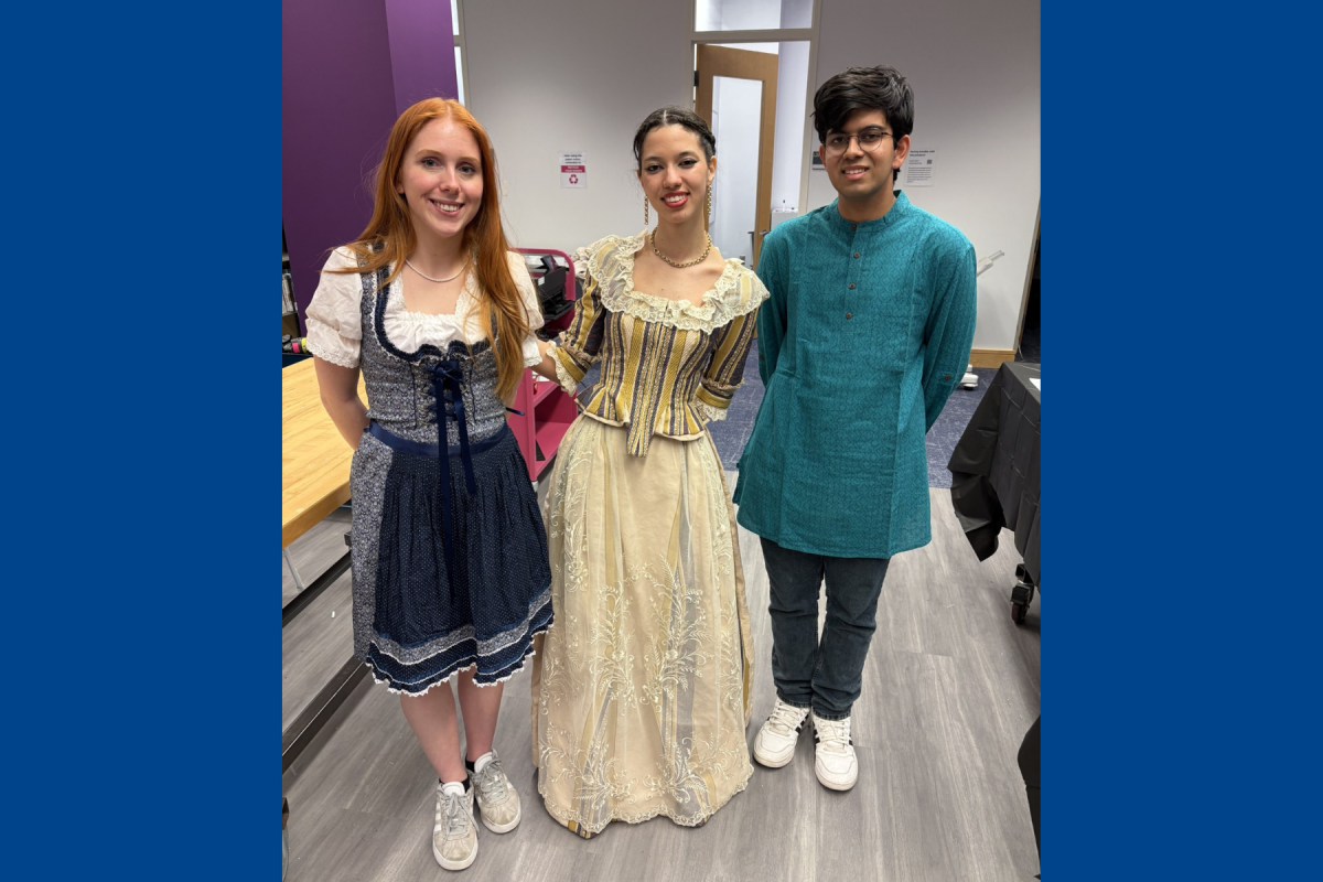 Three students pose for a photo at the Olin College Multicultural Fair in February 2025. Three students pose for a photo at the Olin College Multicultural Fair in February 2025.