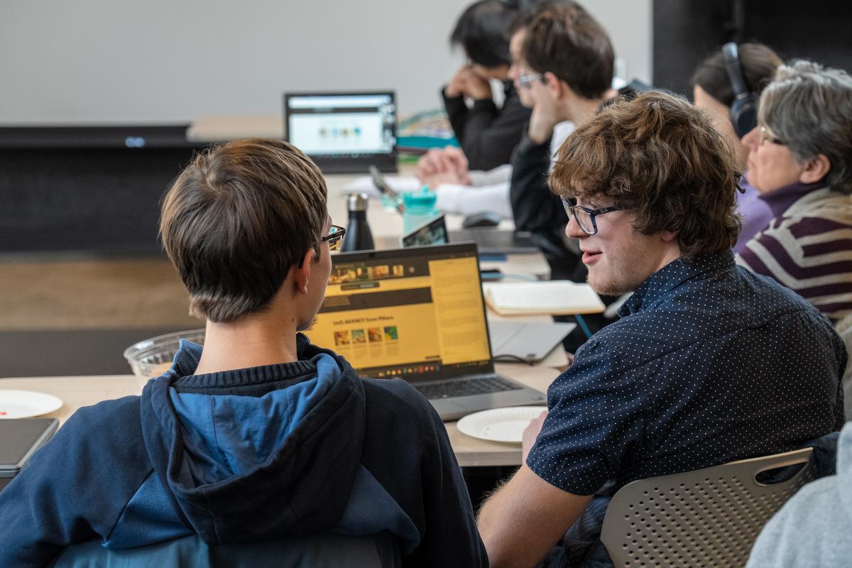 Timur Gray '28 talks with a hackathon teammate at the MIT-Ukraine "Building for Ukraine" hackathon. Timur Gray '28 talks with a hackathon teammate at the MIT-Ukraine "Building for Ukraine" hackathon.