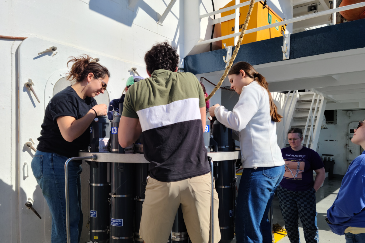 Deep Sea Research Expedition Deep Sea Research Expedition - researchers working on the device on ship