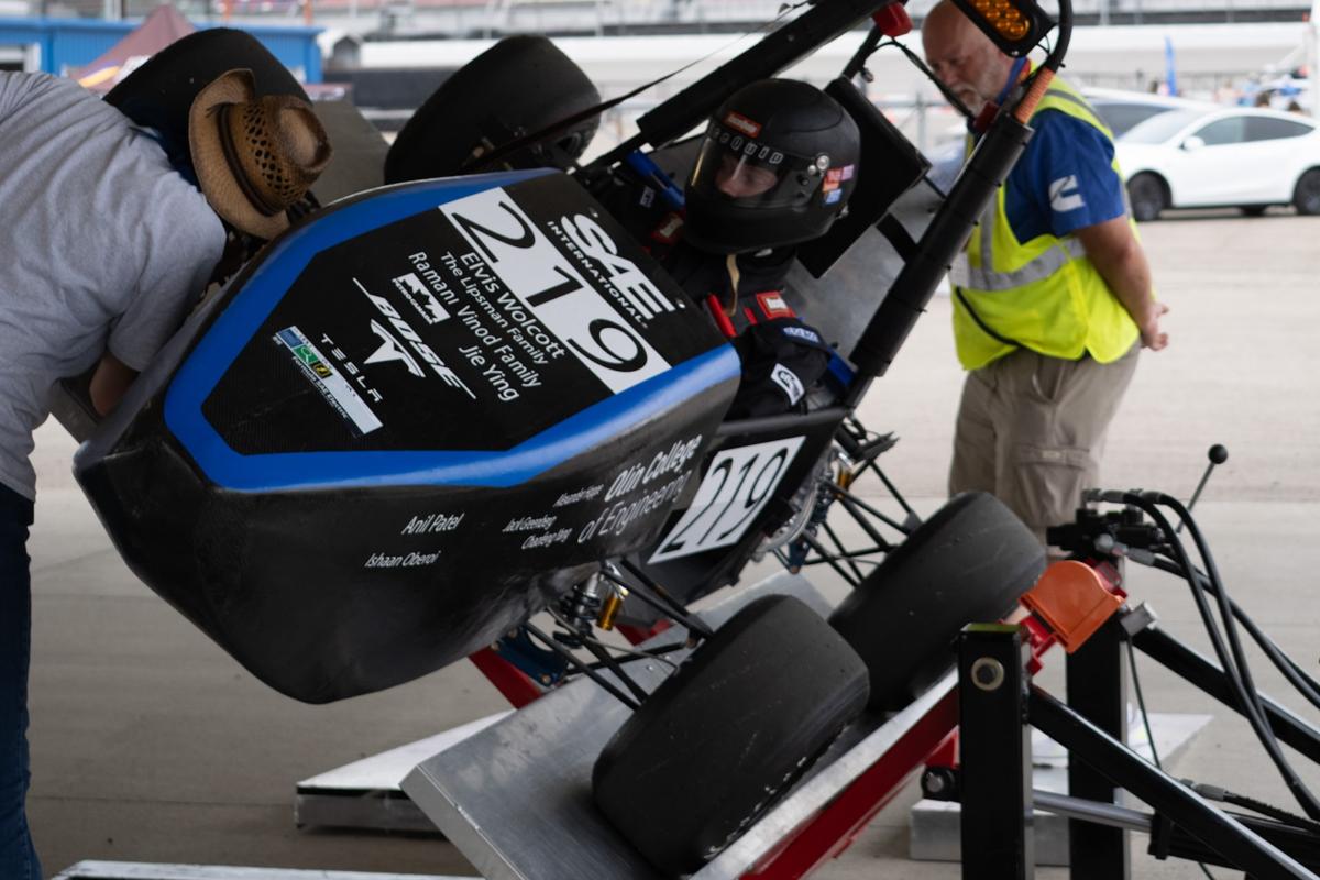 OEM’s MK VII car is seen doing the tilt test where the car is tilted 60 degrees from horizontal with a driver inside to make sure the car’s center of gravity is low enough to prevent the car from rolling.