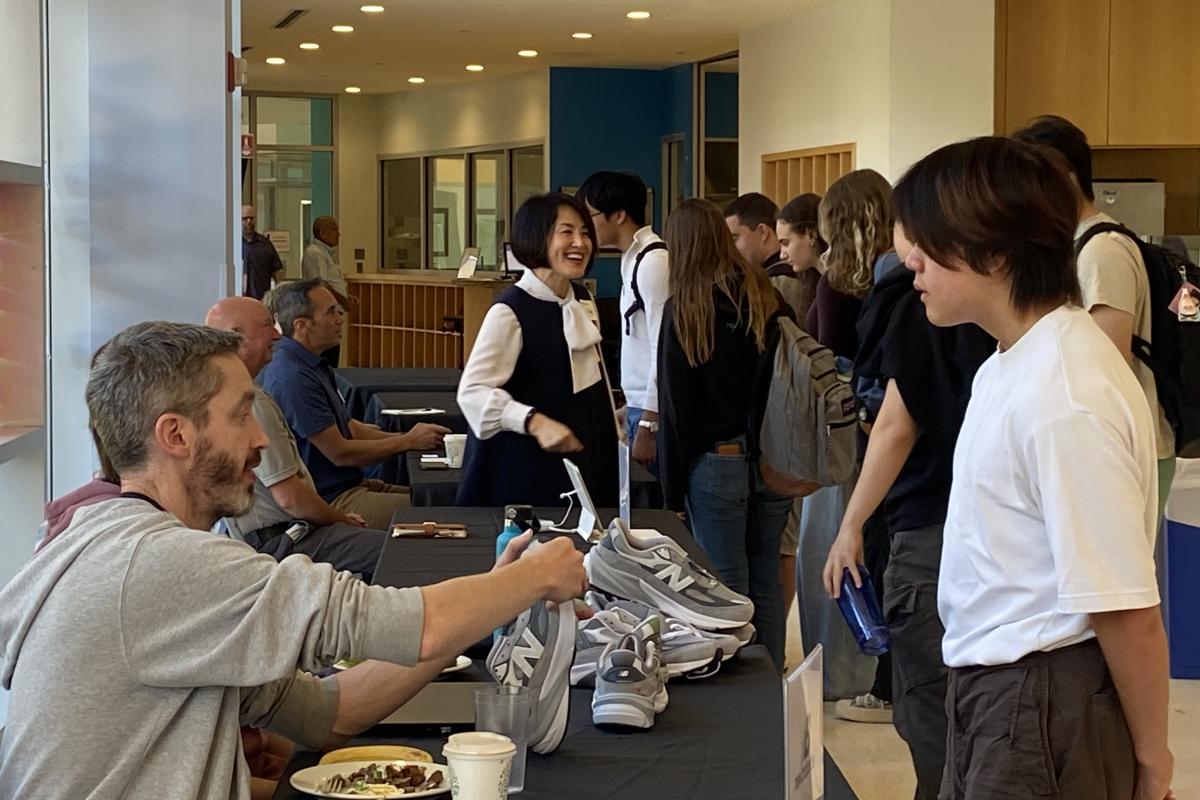 Students speak with SCOPE Liaisons at the Sponsor Showcase. Students speak with SCOPE Liaisons at the Sponsor Showcase.