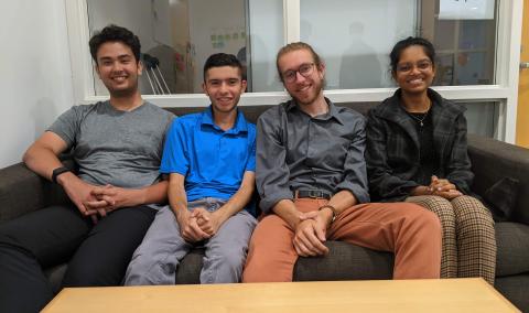 Fidelity Center for Applied Technology Student Team Photo 2022 4 person student team seated on couch