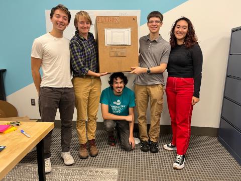Brandeis SCOPE team 2022 Five Students with a box