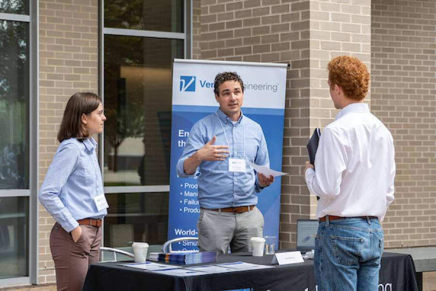 Career Fair table outdoors in the Oval at Olin College