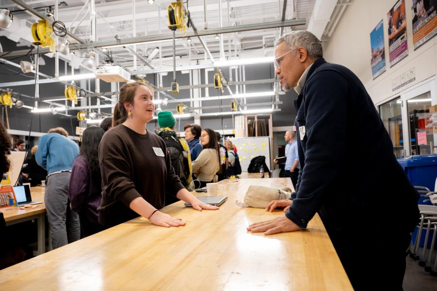 Declan K. '24 is seen talking with an ADE Showcase attendee at the Weismann Foundry. Declan K. '24 is seen talking with an ADE Showcase attendee at the Weismann Foundry.