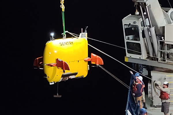 Deep Sea Research Expedition - researchers unloading device