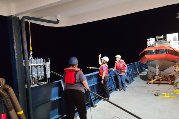 Deep Sea Research Expedition - researchers unloading device