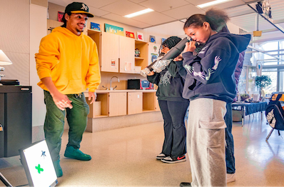 Students standing in a classroom