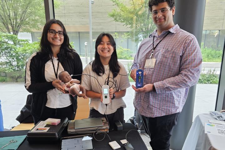 Olin College student researchers demonstrate their reprogrammable user interface prototypes that support early detection of hearing loss in children. 