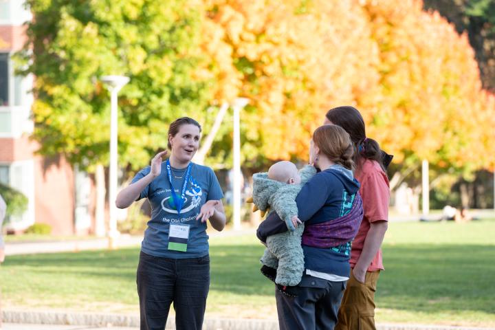 Alumni talking during Alumni Family Weekend on Campus