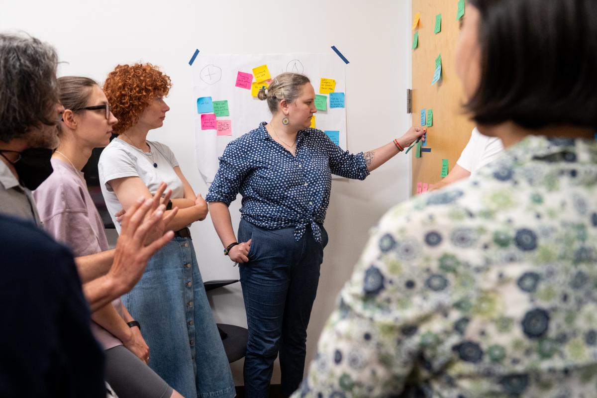 Summer Studio 2025 participants are shown applying concepts through hands-on activities and reflection.