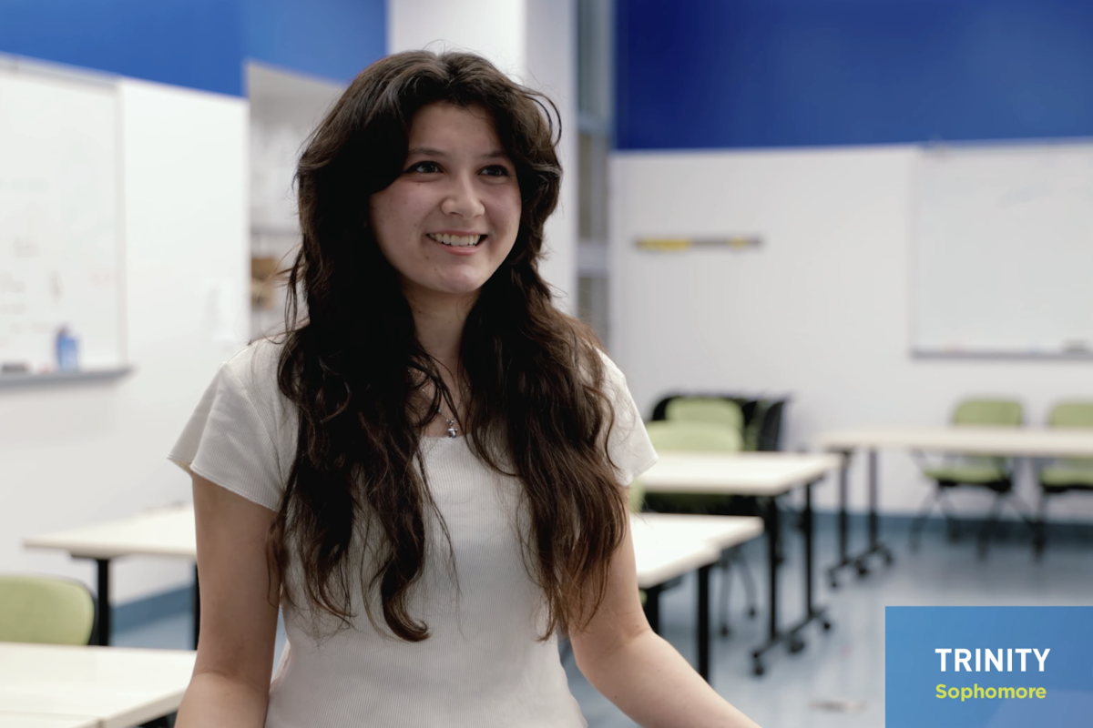Trinity, an Olin sophomore, speaks to the camera during an interview.