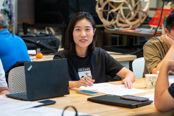 A Summer Studio 2025 participant smiles at the camera.