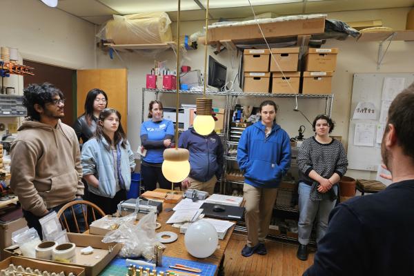 Students and staff learn more about the O&G Studio. 